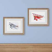 Thumbnail for Fokker Watercolor Print Framed and hanging above baby's crib