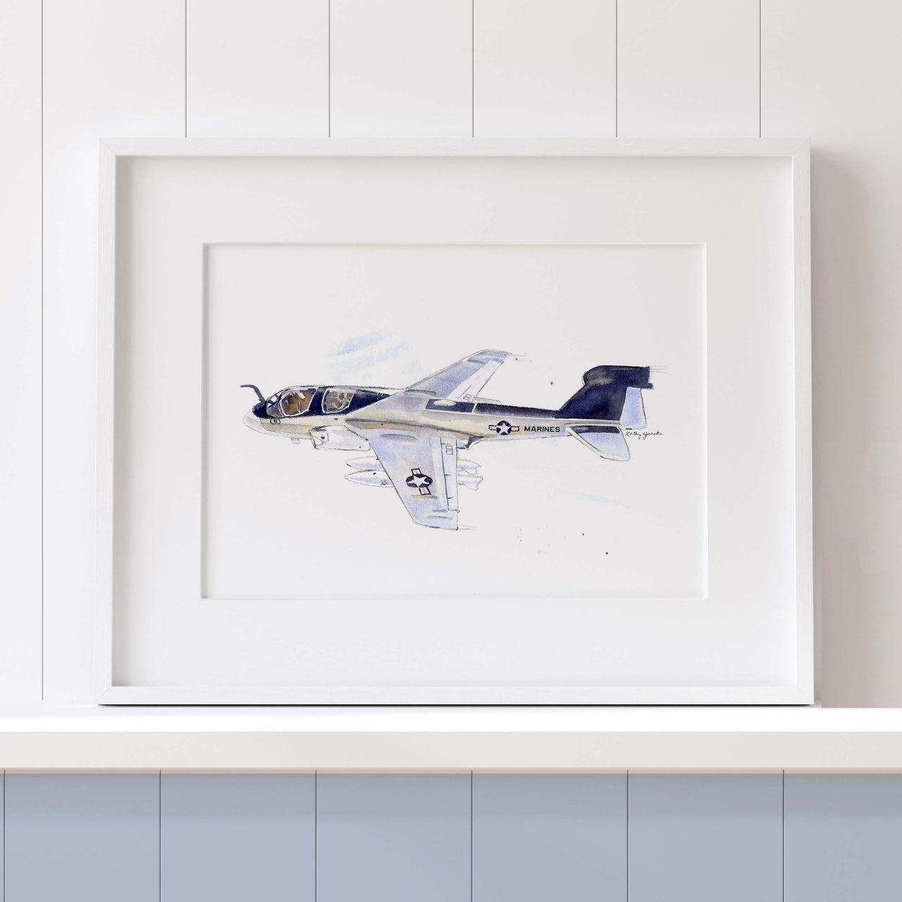 An example of an EA-6B Prowler watercolor print framed with a white mat and white frame