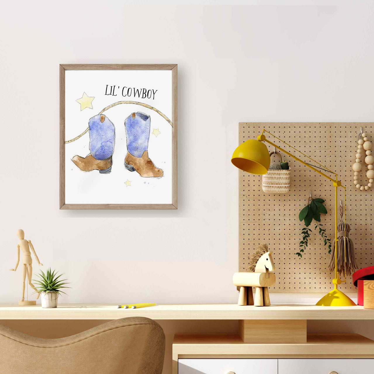 Western nursery decor with cowboy boot illustration