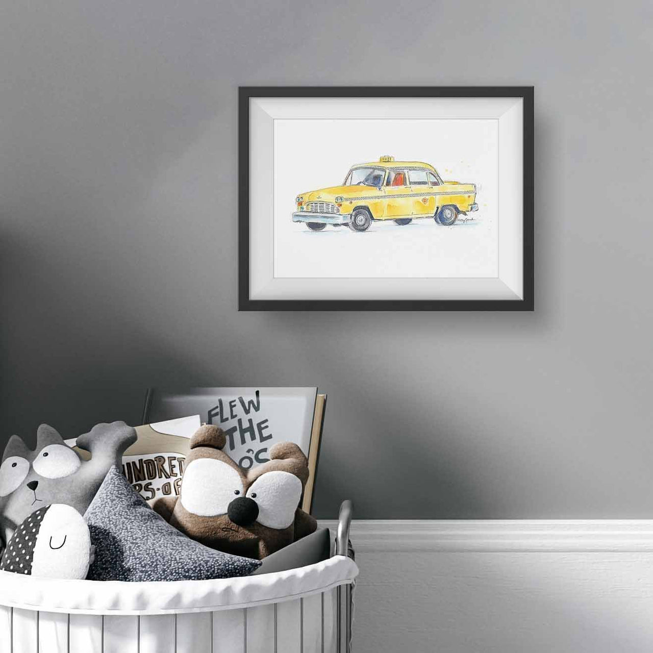 black framed vintage yellow tax cab art print in kids bedroom