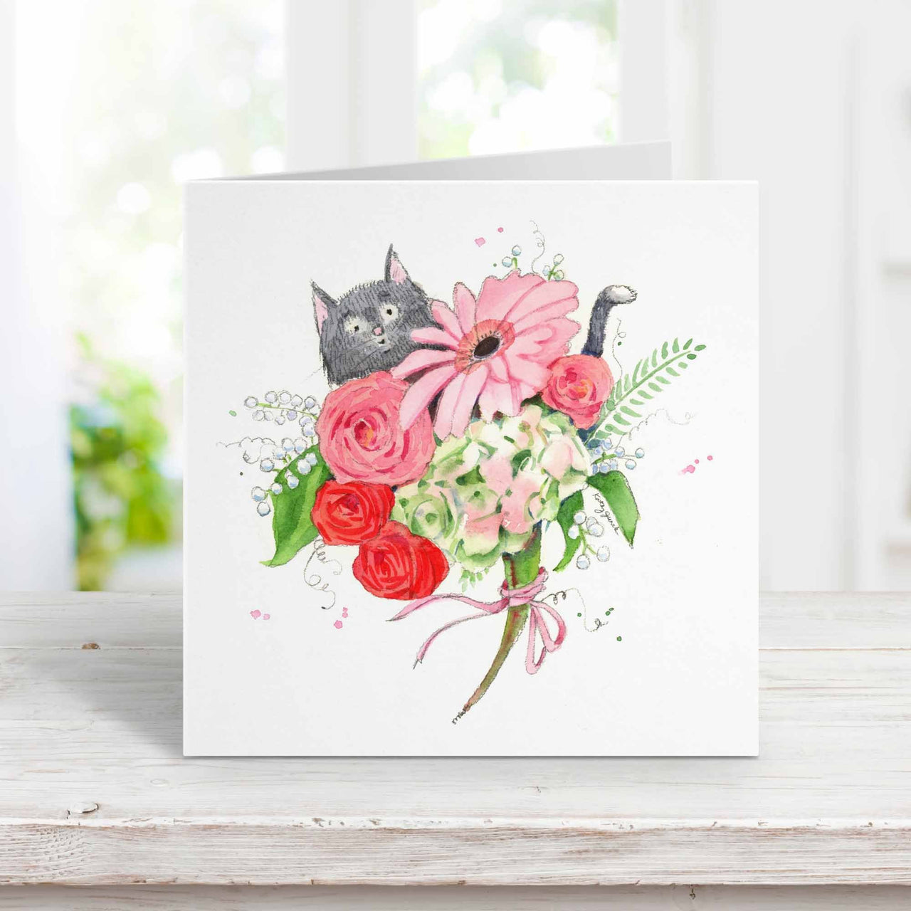 gray cat with flowers card for her birthday